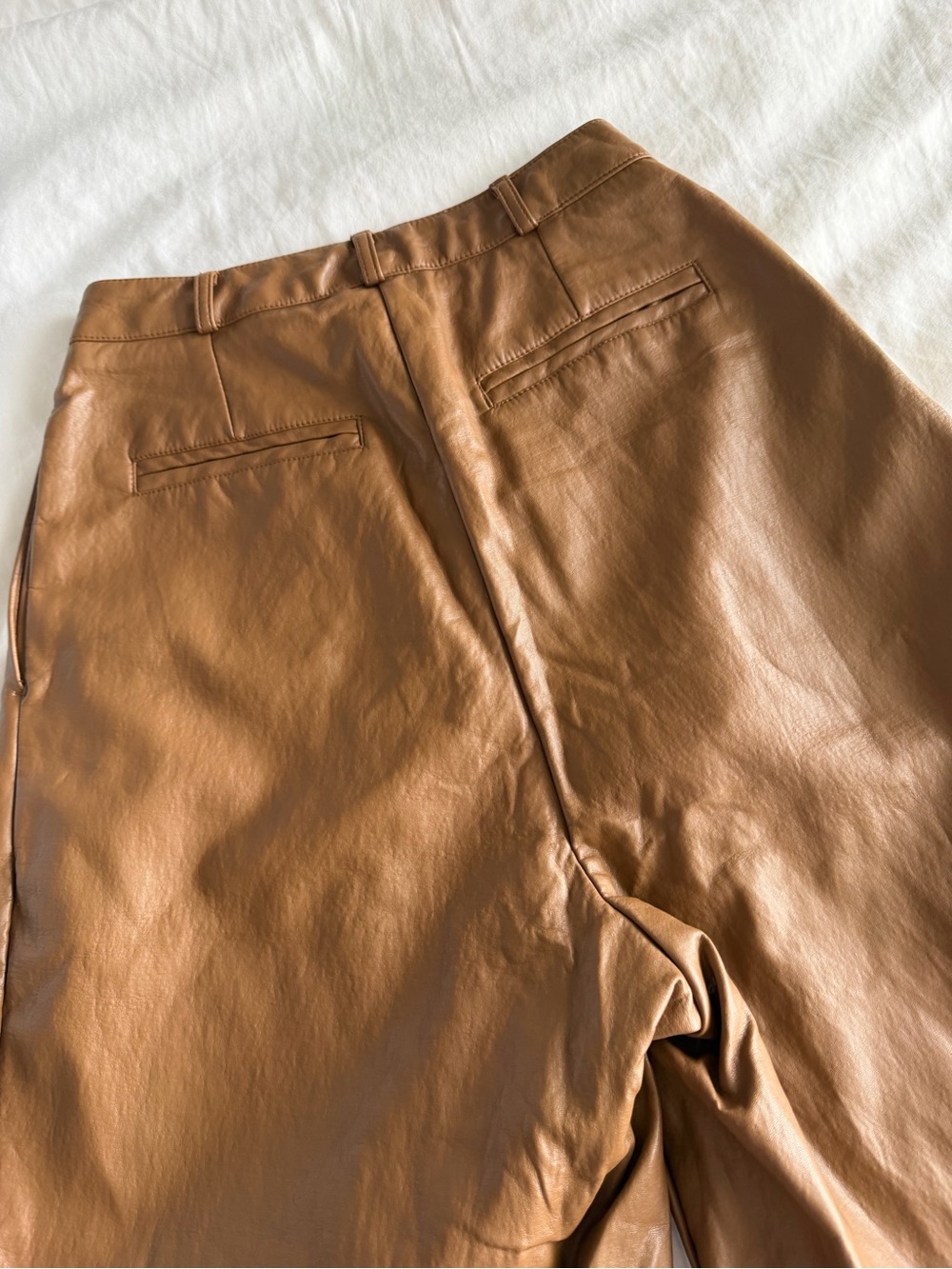 The Frankie Shop Pernille Pleated Faux Leather Shorts in Brown - Picture 12 of 16